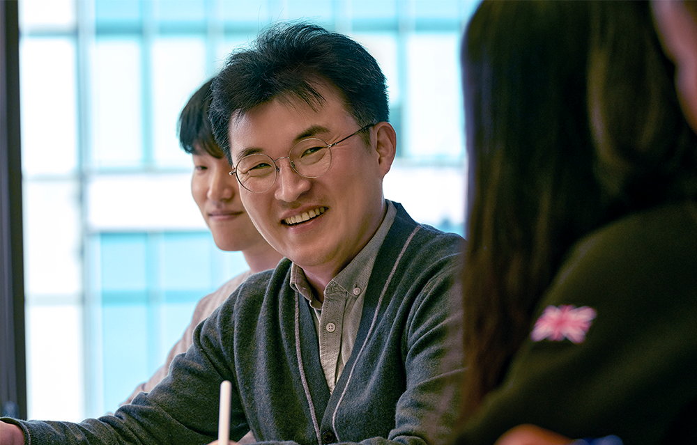 Yi points to communication, trust, and care in his organization as the cornerstones of success